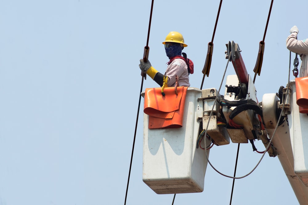 Electricians,Work,Together,On,The,Electric,Cable,Car,And,Electric