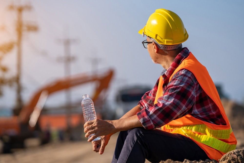 Male,Engineer,Takes,A,Break,To,Drink,Water,To,Relax